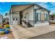 Well-maintained single-story home with covered parking and appealing landscaping at 17200 W Bell Rd # 1643, Surprise, AZ 85374