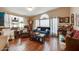 Inviting living room filled with natural light, hardwood floors, and charming decor at 17200 W Bell Rd # 1643, Surprise, AZ 85374