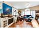 Bright living room with stylish decor, hardwood floors, and large windows at 17200 W Bell Rd # 1643, Surprise, AZ 85374