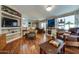Spacious living area with hardwood floors and an open floor plan, great for gatherings at 17200 W Bell Rd # 1643, Surprise, AZ 85374