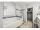 This is a bathroom featuring a soaking tub, glass shower, and entry to a walk-in closet at 18543 E Purple Sage Dr, Queen Creek, AZ 85142