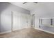 Bedroom area featuring a built-in desk, closet, and carpeted flooring at 18543 E Purple Sage Dr, Queen Creek, AZ 85142