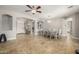 Expansive living space seamlessly connects the dining area and front entrance at 18543 E Purple Sage Dr, Queen Creek, AZ 85142