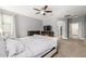 This primary bedroom offers ample space, carpeting, and an en-suite bathroom at 18543 E Purple Sage Dr, Queen Creek, AZ 85142