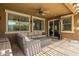Cozy patio with cushioned seating, an outdoor heater, and ample space for relaxation and entertainment at 18543 E Purple Sage Dr, Queen Creek, AZ 85142
