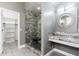 Bathroom with a glass-enclosed shower and granite counter vanity at 18575 E Pine Barrens Ave, Queen Creek, AZ 85142