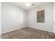 Bedroom with tan carpet flooring, one window, and neutral walls at 18575 E Pine Barrens Ave, Queen Creek, AZ 85142