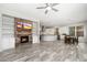 Open-concept floor plan with a living room that flows seamlessly into the kitchen and dining areas at 18575 E Pine Barrens Ave, Queen Creek, AZ 85142