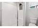 Bathroom featuring a glass door enclosed shower, neutral wall color, and a toilet at 21296 N 270Th Ln, Buckeye, AZ 85396