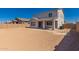 Wide open backyard featuring covered patio and block wall creating a private outdoor space at 21830 E Bonanza E Ct, Queen Creek, AZ 85142