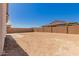 Large backyard with privacy wall, ready for landscaping and entertaining at 21830 E Bonanza E Ct, Queen Creek, AZ 85142