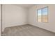 Bedroom with carpet flooring, natural light, and a spacious layout at 21830 E Bonanza E Ct, Queen Creek, AZ 85142