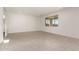 Spacious and bright living area featuring tile flooring throughout at 21830 E Bonanza E Ct, Queen Creek, AZ 85142
