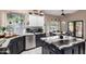 Modern kitchen boasts granite countertops, stainless steel appliances, and abundant natural light at 2226 E Beachcomber Dr, Gilbert, AZ 85234