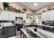 Stylish kitchen featuring granite countertops, a center island, and stainless steel appliances at 2226 E Beachcomber Dr, Gilbert, AZ 85234