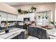 Well-appointed kitchen featuring granite countertops, stainless steel appliances, and ample storage space at 2226 E Beachcomber Dr, Gilbert, AZ 85234