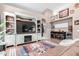 Comfortable living room showcasing built-in shelving, rustic accents, and a stylish bar area at 2226 E Beachcomber Dr, Gilbert, AZ 85234