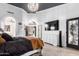 Main bedroom with a fireplace, bright white trim and lots of natural light at 2226 E Beachcomber Dr, Gilbert, AZ 85234
