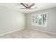 Light filled bedroom has plantation shutters and tiled floors at 2698 E Carla Vista Dr, Gilbert, AZ 85295