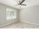 Bedroom has a ceiling fan, and plantation shutters at 2698 E Carla Vista Dr, Gilbert, AZ 85295