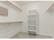 Spacious walk-in closet offers ample storage with built-in shelves and rods at 2698 E Carla Vista Dr, Gilbert, AZ 85295