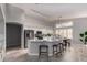 Well-lit kitchen featuring an island with seating and modern appliances; perfect for entertaining at 2698 E Carla Vista Dr, Gilbert, AZ 85295