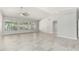 Bright and spacious living room with large windows, tile flooring, and neutral paint at 2698 E Carla Vista Dr, Gilbert, AZ 85295