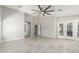 Expansive living space boasting tile floors, neutral paint, open archways, and easy access to the outdoors at 2698 E Carla Vista Dr, Gilbert, AZ 85295