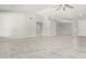 Spacious and airy living room with neutral decor, tile floors, and a welcoming atmosphere at 2698 E Carla Vista Dr, Gilbert, AZ 85295