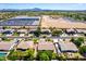Aerial view of a neighborhood with commercial development at 2698 E Carla Vista Dr, Gilbert, AZ 85295