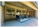 Covered patio with comfortable seating and ceiling fan at 2698 E Carla Vista Dr, Gilbert, AZ 85295