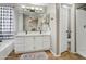 Bathroom boasts double sinks, a large mirror, bathtub, and a separate shower at 2727 S Sawyer Cir, Mesa, AZ 85209