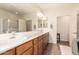 Spacious bathroom with double sinks, and a door leading to the water closet at 289 W Ironhorse Ln, San Tan Valley, AZ 85143