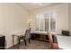 Bright office with white plantation shutters, tiled floor, and simple furnishings at 289 W Ironhorse Ln, San Tan Valley, AZ 85143