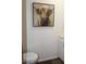 Bathroom featuring a sink, vanity, light fixture, and an interesting painting at 303 S Recker Rd # 218, Mesa, AZ 85206