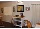 Dining nook showcasing an intimate space with chairs and elegant shelving for storage at 303 S Recker Rd # 218, Mesa, AZ 85206