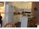 Well-organized kitchen with white cabinetry and essential appliances for efficient cooking at 303 S Recker Rd # 218, Mesa, AZ 85206