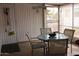 Patio with table and chairs. Screened in porch or sunroom at 303 S Recker Rd # 218, Mesa, AZ 85206