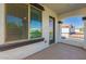 Inviting balcony space with stucco walls offering a picturesque view of the surrounding neighborhood at 3129 E Franklin Ave, Gilbert, AZ 85295