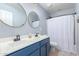 Beautiful bathroom with double sinks, stylish mirrors, and updated fixtures at 3129 E Franklin Ave, Gilbert, AZ 85295