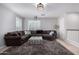 Comfortable living room features a large sectional sofa and neutral color palette at 3129 E Franklin Ave, Gilbert, AZ 85295