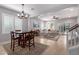 Open-concept living room with an adjacent dining area at 3129 E Franklin Ave, Gilbert, AZ 85295