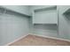 Spacious walk-in closet with ample shelving and storage space at 3129 E Franklin Ave, Gilbert, AZ 85295