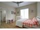 Charming bedroom with a ceiling fan, hardwood floors, and a walk-in closet at 3564 N Tuscany --, Mesa, AZ 85207