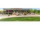 Clubhouse featuring meticulously manicured landscaping, elegant architecture, and inviting outdoor gathering spaces for members at 3564 N Tuscany --, Mesa, AZ 85207