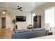 Comfortable living room showcasing natural lighting, a ceiling fan and neutral colors at 3564 N Tuscany --, Mesa, AZ 85207
