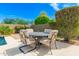 Backyard patio with a table and chairs for outdoor dining and entertaining at 3871 S Marion Way, Chandler, AZ 85286