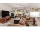 Comfortable living room featuring tile floors, large window, and comfortable seating at 3871 S Marion Way, Chandler, AZ 85286