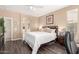 Bright main bedroom with wood floors and ample natural light at 3871 S Marion Way, Chandler, AZ 85286