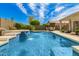 Sparkling pool with a fountain and lush landscaping in the private backyard at 3871 S Marion Way, Chandler, AZ 85286